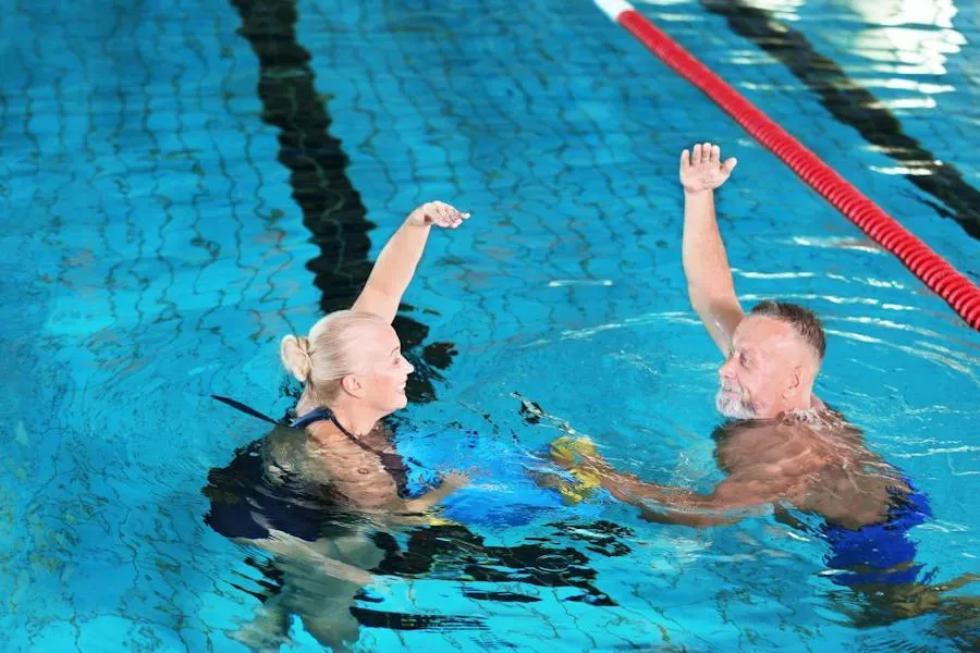 Therapist guiding a patient through warm water aquatic therapy